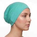 Flat lay of celadon premium soft stretch knitted cotton under scarf cap by SCARF 'N' SHAWLS measuring 24.5 cm x 22 cm