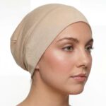 Flat lay of fresh tint premium soft stretch knitted cotton under scarf cap by SCARF 'N' SHAWLS measuring 24.5 cm x 22 cm