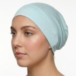 Flat lay of ice-mintpremium soft stretch knitted cotton under scarf cap by SCARF 'N' SHAWLS measuring 24.5 cm x 22 cm
