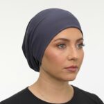 Flat lay of ink-blue premium soft stretch knitted cotton under scarf cap by SCARF 'N' SHAWLS measuring 24.5 cm x 22 cm