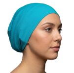 Flat lay of pool-blue premium soft stretch knitted cotton under scarf cap by SCARF 'N' SHAWLS measuring 24.5 cm x 22 cm