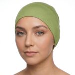 Flat lay of yellow-green premium soft stretch knitted cotton under scarf cap by SCARF 'N' SHAWLS measuring 24.5 cm x 22 cm