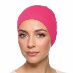 Flat lay of Fuchsia premium soft stretch knitted cotton under scarf cap by SCARF 'N' SHAWLS measuring 24.5 cm x 22 cm