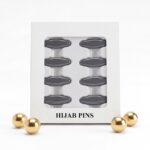 Pack of 8 snag-free hijab safety clips in [Colour Name] displayed in a white window box for scarf and clothing decoration.