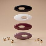 A set of four oval solid-colour safety pin buckles for hijab and scarf styling, featuring a hidden pin design in Monochrome Mix