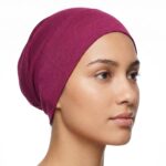 Flat lay of boysenberry premium soft stretch knitted cotton under scarf cap by SCARF 'N' SHAWLS measuring 24.5 cm x 22 cm