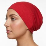 Flat lay of bright-red premium soft stretch knitted cotton under scarf cap by SCARF 'N' SHAWLS measuring 24.5 cm x 22 cm