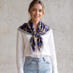 Women's 70x70cm 100% polyester square scarf featuring vibrant prints including leopard, polka dot, and floral, styled as a neck accessory or laid flat.