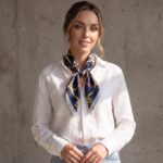 Women's 70x70cm 100% polyester square scarf featuring vibrant prints including leopard, polka dot, and floral, styled as a neck accessory or laid flat.
